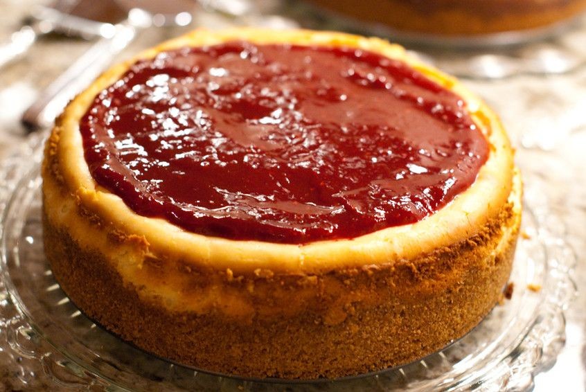 Amaretto Cheesecake with Raspberry Coulis