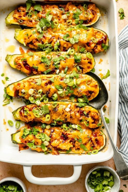 Cheesy Chicken and Quinoa Stuffed Zucchini