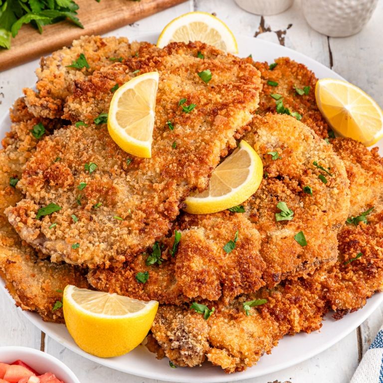 Classic Beef Milanesa with Lemon Wedges