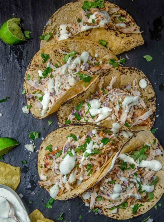 Spicy ground chicken tacos with avocado crema