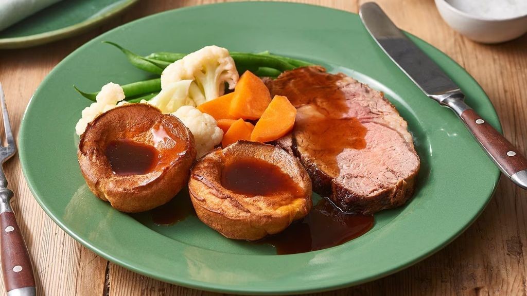 Traditional English Sunday Roast Beef with Yorkshire Pudding